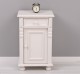 Nightstand with ornaments, 1 door and 1 drawer